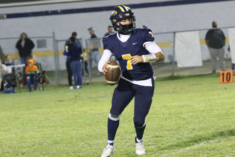 Northeast's Jaiden Puig waits for his wide receiver to come open before he throws the ball against Clarksville in the first quarter of their high school football game Friday, Sept. 23, 2022 at Northeast High in Clarksville, Tennessee.