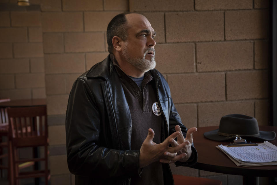 Eric Suchodolski, chair of the committee to recall Cochise County Board of Supervisors Tom Crosby, speaks with a reporter at Sierra Vista Public Library, Tuesday, Feb. 14, 2023, in Sierra Vista, Ariz. Suchodolski says the recall effort developed out of frustration for Crosby's refusal to certify the 2022 midterm elections, but it is meant to prevent future delays in the certification process of elections. (AP Photo/Alberto Mariani)