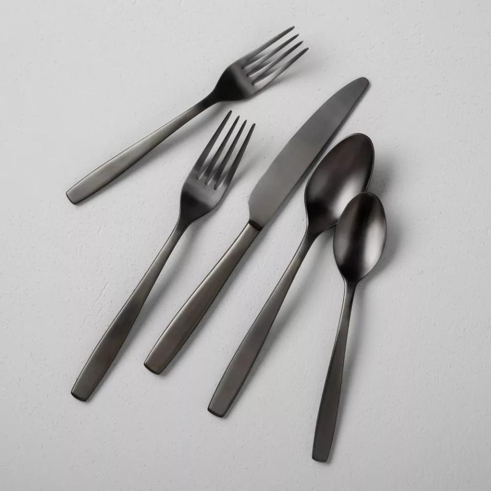 Black silverware on light grey background