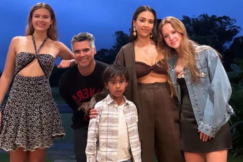 <p>Jessica Alba/Instagram</p> Jessica Alba and Cash Warren pose with their kids Honor, Haven and Hayes