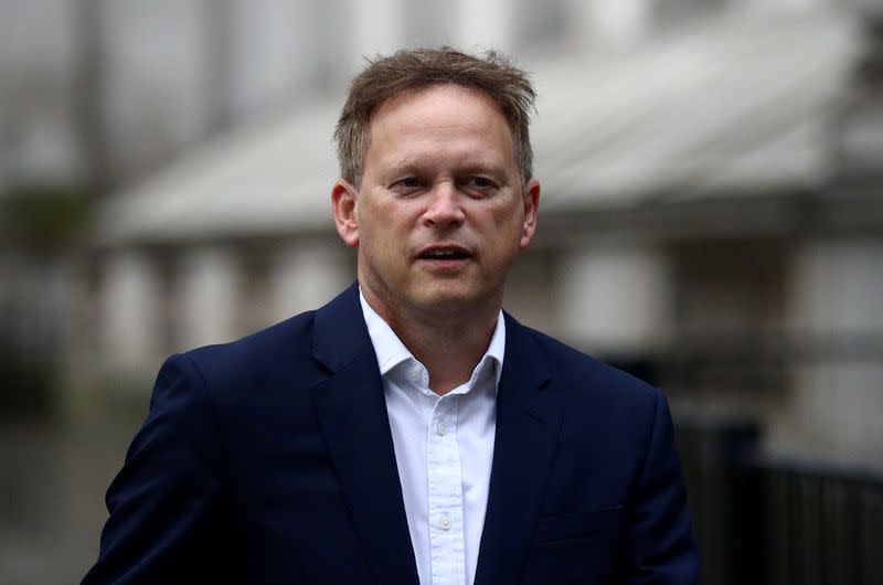 FILE PHOTO: Britain's Transport Secretary Grant Shapps walks outside the Cabinet Office in London