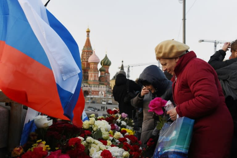 Russian opposition leader Boris Nemtsov was shot dead while walking across a bridge a short distance from the Kremlin with his girlfriend