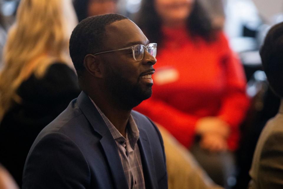 Mayor-elect Paul Young smiles as Mayor Jim Strickland speaks during the “Truth in Data: Understanding the Black Business Journey” information session at the National Civil Rights Museum in Memphis, Tenn., on Wednesday, October 11, 2023.