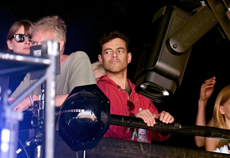 Rami Malek watches Blondie (Leon Neal/Getty Images)