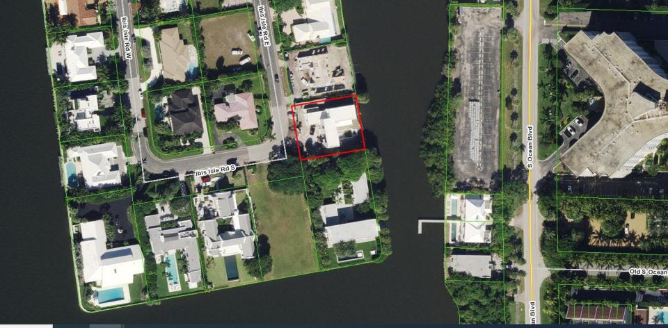 An aerial photo shows the property that just sold for a recorded $12.5 million at 2291 Ibis Isle Road E., which is outlined in red, center, on Ibis Isle in the Intracoastal Waterway. Part of the South End of Palm Beach can be seen at the right.