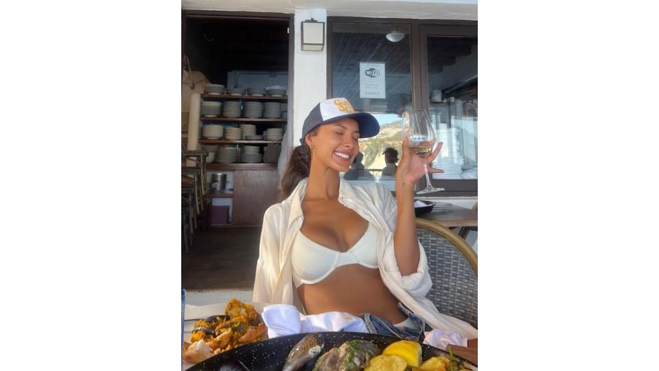 Matching her bikini to her wine grape is iconic