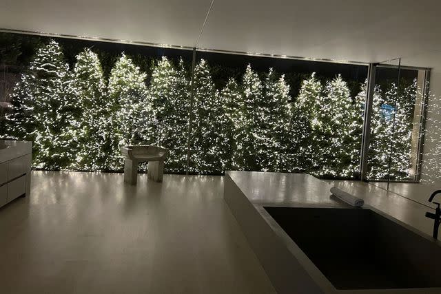 <p>Kim Kardashian/Instagram</p> The sparkling evergreen display in Kim Kardashian's bathroom.