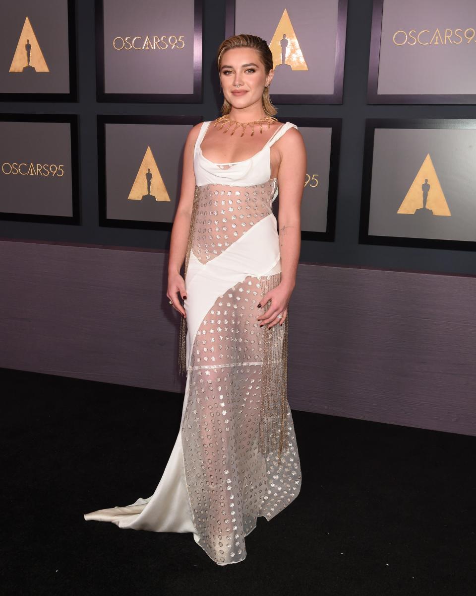Florence Pugh in a white, sheer gown with polka dots