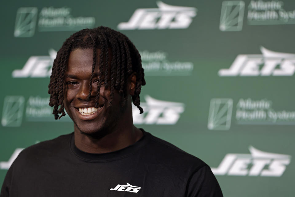 New York Jets' Olu Fashanu speaks to the media after an NFL rookie minicamp football practice Friday, May 3, 2024, in Florham Park, N.J. (AP Photo/Adam Hunger)