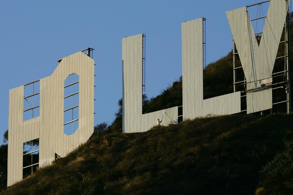 Painters work on the Hollywood Sign on November 16, 2005 in Los Angeles, California.