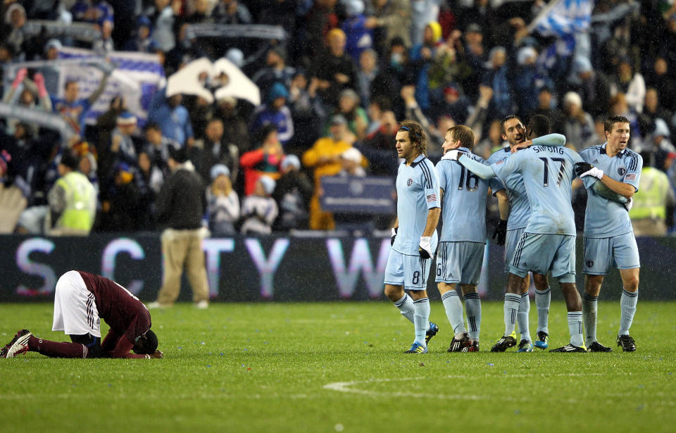 KANSAS CITY, KS - NOVEMBER 02: Players celebrate after the final whistle as Sporting Kansas City defeats the Colorado Rapids 2-0 to win the MLS playoff game on November 2, 2011 at LiveStrong Sporting Park in Kansas City, Kansas. (Photo by Jamie Squire/Getty Images)