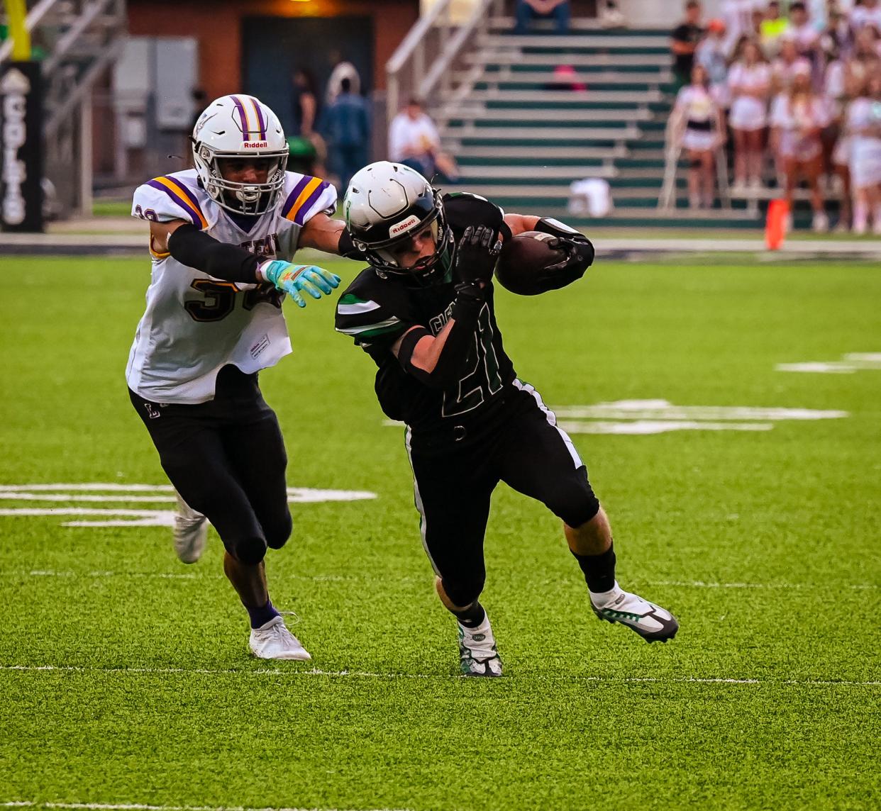 Clear Fork's Trystyn Robison rumbles for onw of his two rushing touchdowns during the Colts' win over Lexington in Week 3.