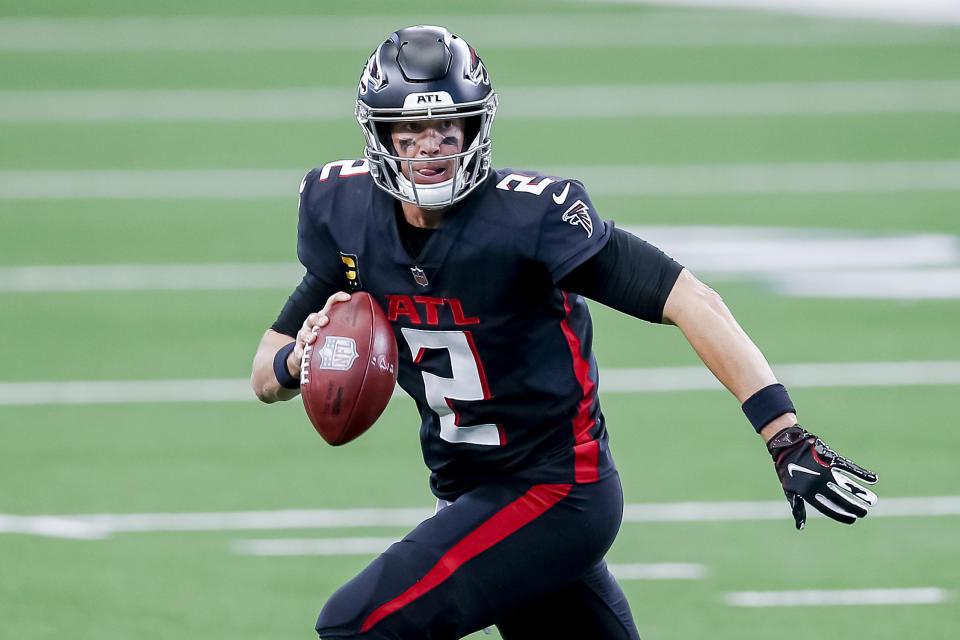 FILE - In this Sunday, Sept. 20, 2020, file photo, Atlanta Falcons quarterback Matt Ryan (2) looks to pass during an NFL football game against the Dallas Cowboys in Arlington, Texas. Ryan isn't allowing himself to wonder if the ouster of the Atlanta Falcons' coach and general manager this week could lead to a roster overhaul following the season that could impact his career. (AP Photo/Brandon Wade, File)