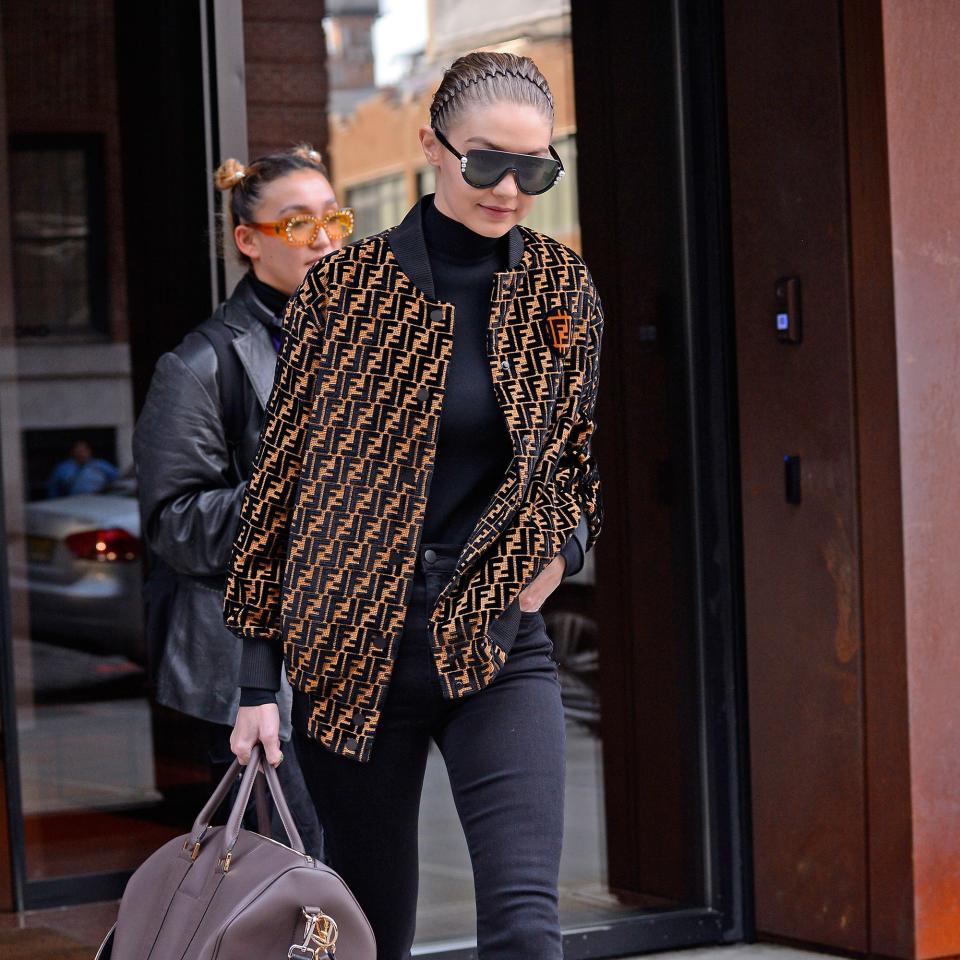 Gigi Hadid is on her way to Milan Fashion Week, and she’s already paying homage to the Italian fashion capital.