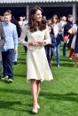 <p>In her lemon See by Chloé dress at a tea party she hosted for the children of servicemen at Buckingham Palace. She wore the same dress to a children's tea party in Canada in September 2016.</p>