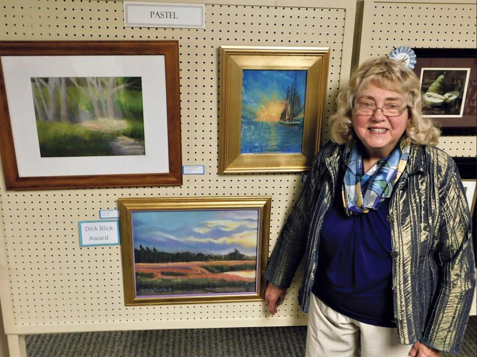 Corinne Goodrich was awarded the Dick Blick Award for her oil "Golden Twilight" at the Greater Gardner Artists Association's 31st annual Spring Art Show in 2019.