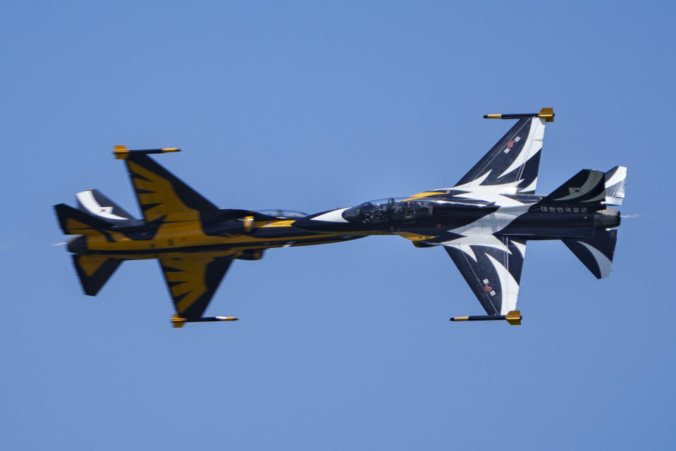 South Korean Air Force's Black Eagles aerobatic team performs during the first day of the Singapore Airshow in Singapore, Tuesday, Feb. 20, 2024. (AP Photo/Vincent Thian)