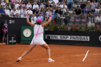 Iga Swiatek, of Poland, reacts after defeating Aryna Sabalenka, of Belarus, in the Italian Open tennis tournament final match at Rome's Foro Italico, Saturday, May 18, 2024. Swiatek won 6-2/6-3. (AP Photo/Alessandra Tarantino)