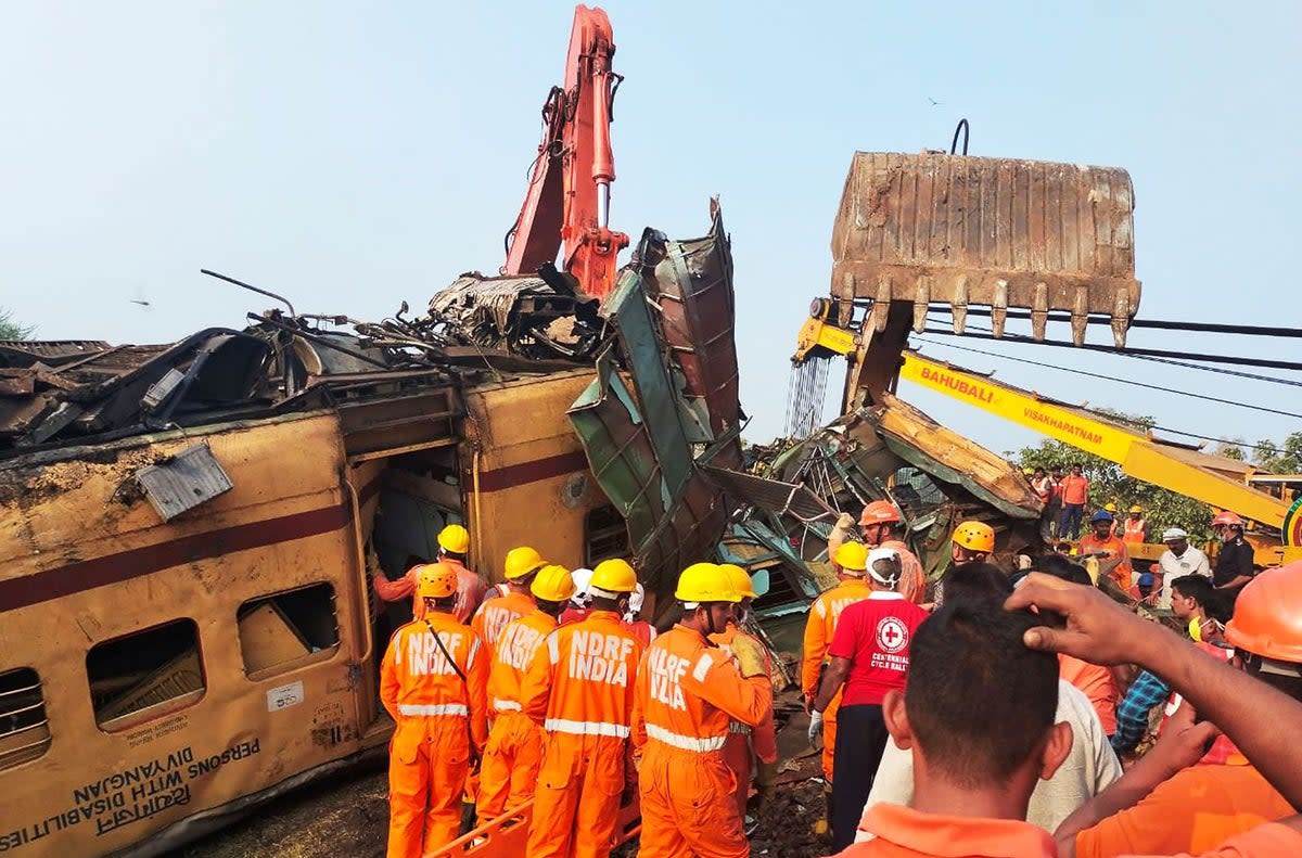 Rescuers at the site of the train crash in Vizianagaram district (AFP via Getty Images)