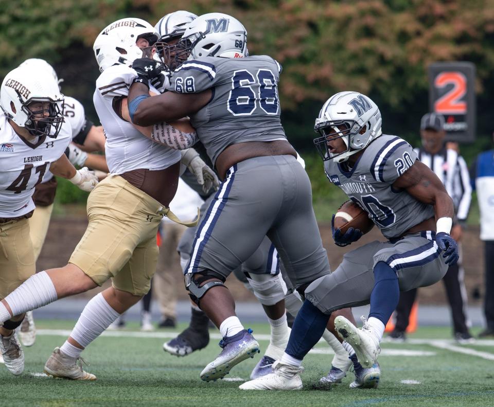 Monmouth’s Jaden Shirden gains yards on the ground. Lehigh at Monmouth University football.  
West Long Branch, NJ
Saturday, September, 30, 2023