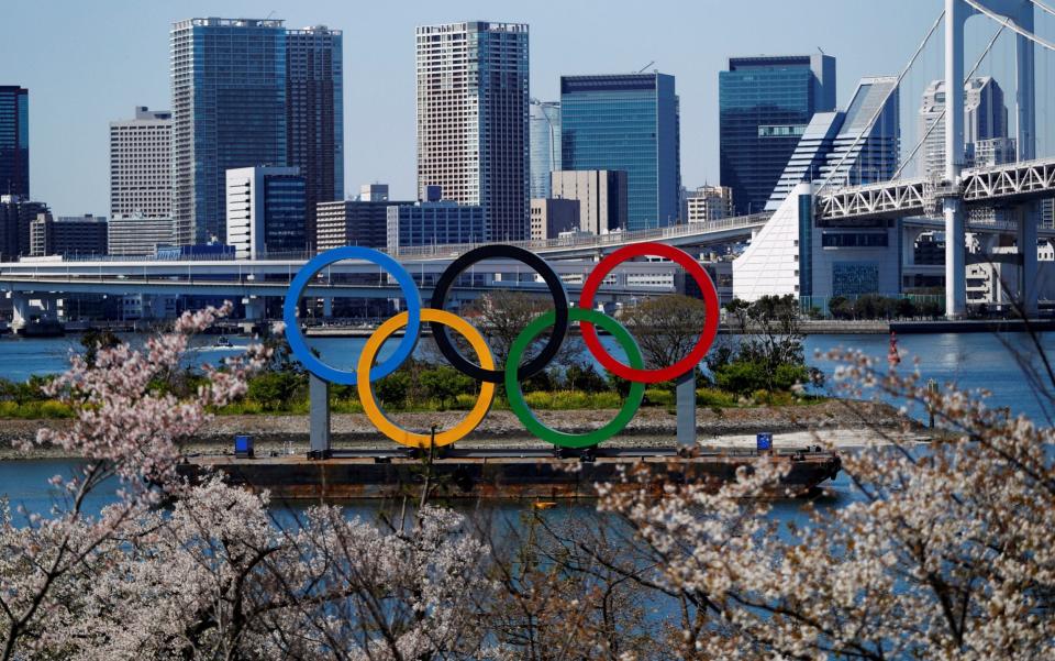 Giant Olympic rings are seen at the waterfront area at Odaiba Marine Park in Tokyo, Japan - REUTERS