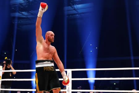 Tyson Fury celebrates at the end of the fight. Reuters / Kai Pfaffenbach Livepic