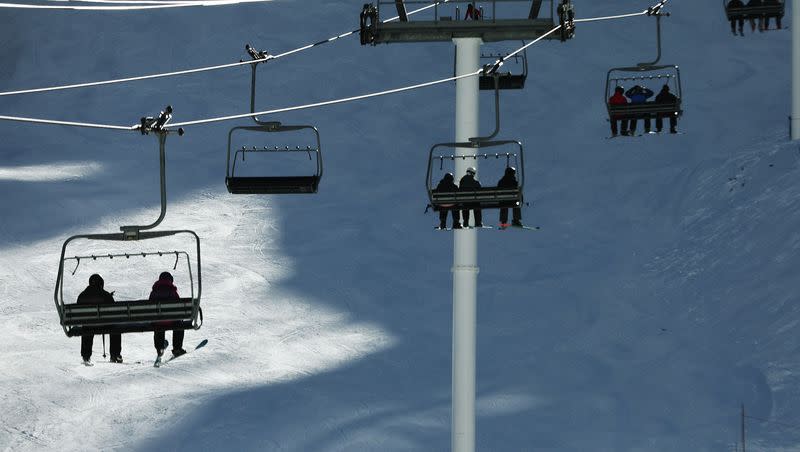 Skiers ride the lift at Alta Ski Resort on Friday, Dec. 15, 2023. Rising prices make it important for skiers to find the best deal possible.