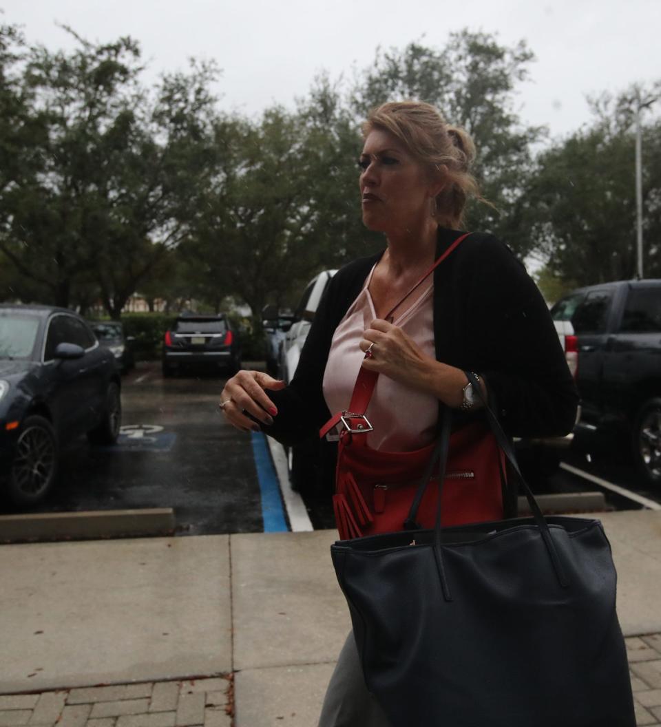 Cape Coral council member Patty Cummings makes her way to City Hall to participate in the council meeting Wednesday, Nov. 15, 2023. After an ongoing investigation by the State AttorneyÕs Office Cummings turned herself in to authorities on Tuesday, Nov. 14, 2023 after being charged with three felonies.