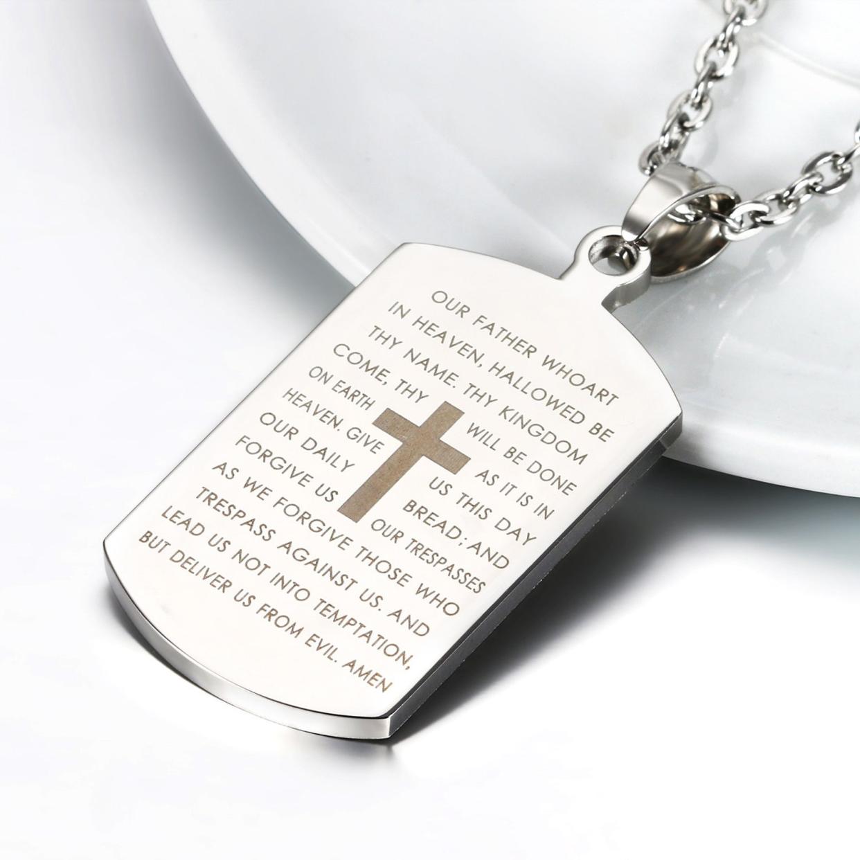 <p><a href="https://go.redirectingat.com?id=74968X1596630&url=https%3A%2F%2Fwww.etsy.com%2Flisting%2F1291595203%2Flords-prayer-cross-dog-tag-stainless&sref=https%3A%2F%2Fwww.womansday.com%2Flife%2Fg23768575%2Fbest-christian-gifts%2F" rel="nofollow noopener" target="_blank" data-ylk="slk:Shop Now;elm:context_link;itc:0;sec:content-canvas" class="link rapid-noclick-resp">Shop Now</a></p><p>Lord's Prayer Cross Dog Tag Stainless Steel Necklace</p><p>etsy.com</p><p>$22.99</p>