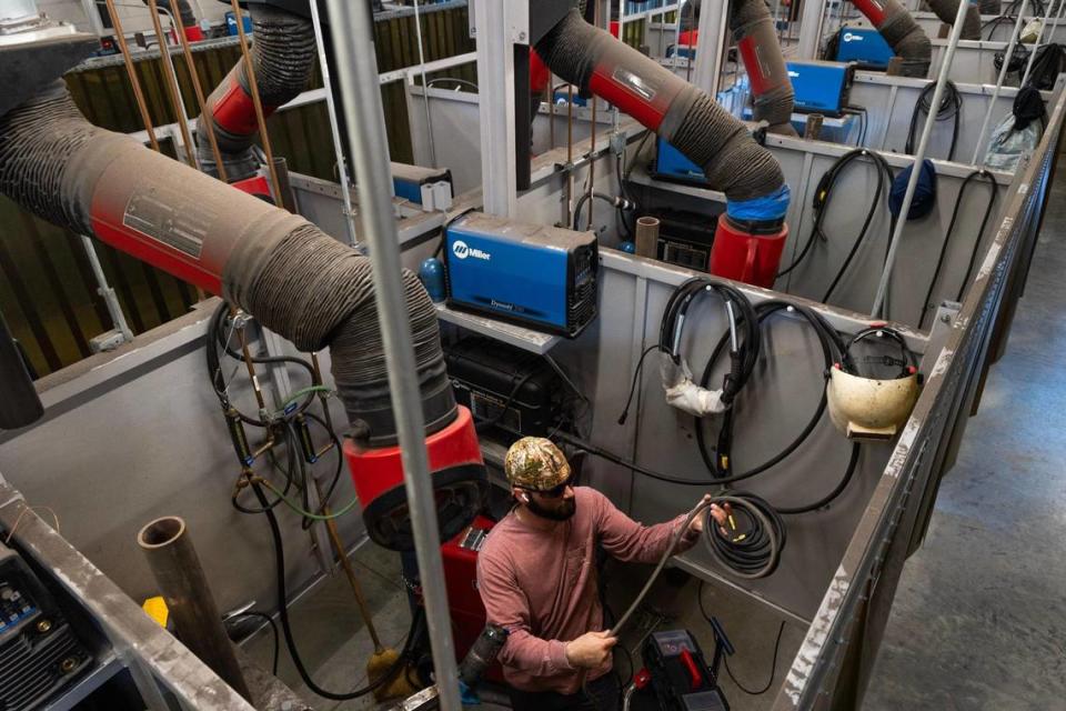 Connor Carson packs up welding equipment at Midlands Technical College on Tuesday, March 5, 2024. Carson is taking a certification course with the college for his job at Dominion Energy.