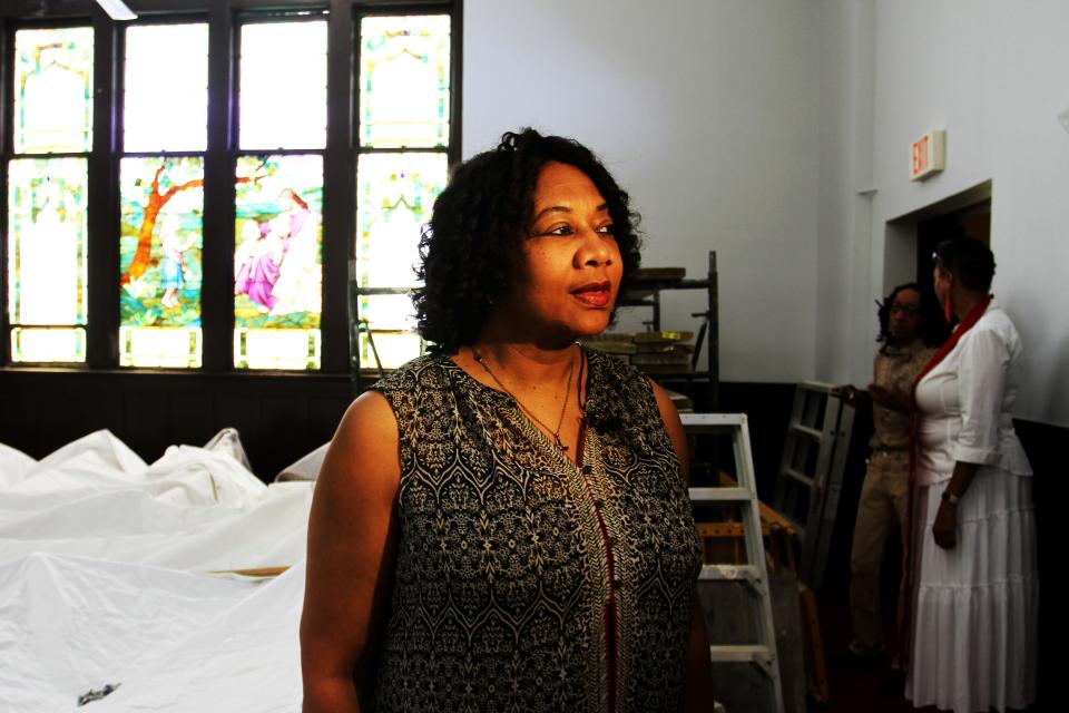 Longtime congregation member Charlotte Hardin speaks with reporters in the Pitts Chapel United Methodist Church, which received a $10,000 historic preservation grant from the National Society of the Daughters of the American Revolution.