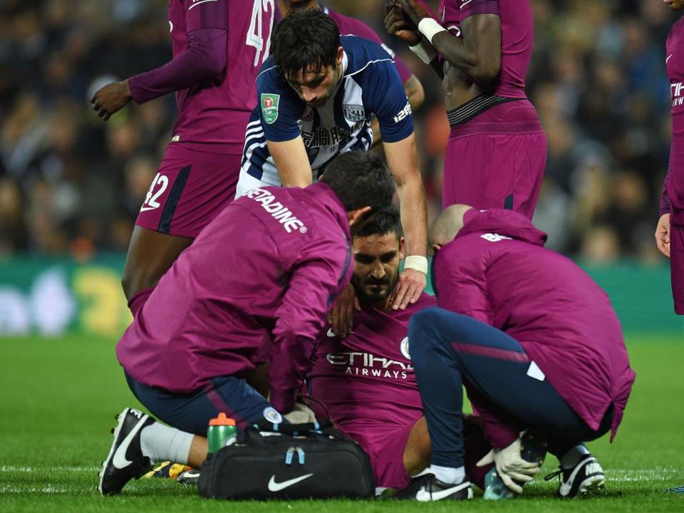 Ilkay Gundogan went off injured after a heavy tackle by Claudio Yacob (Getty)