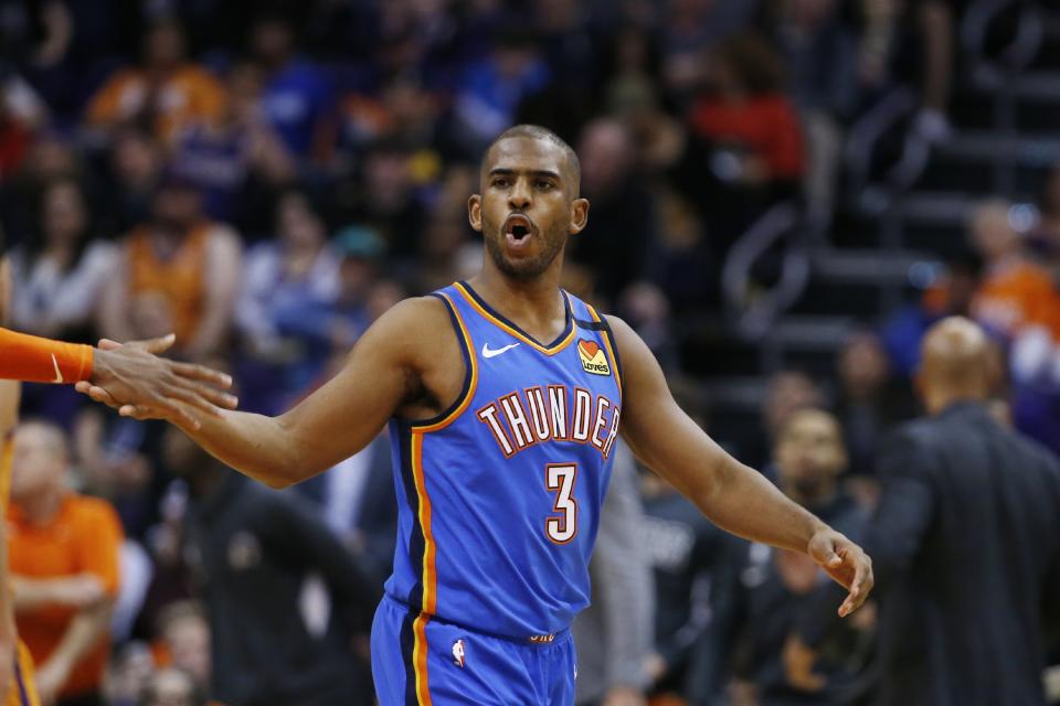 Oklahoma City Thunder guard Chris Paul shouts after making a basket against the Phoenix Suns during the second half of an NBA basketball game Friday, Jan. 31, 2020, in Phoenix. The Thunder won 111-107. (AP Photo/Ross D. Franklin)