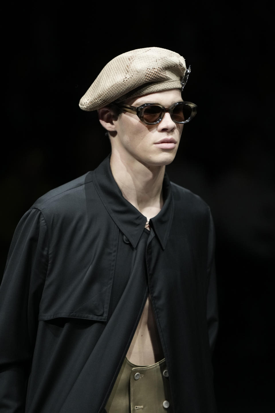 A model wears a creation as part of the Emporio Armani men's Spring Summer 2024 collection presented in Milan, Italy, Saturday, June 17, 2023. (AP Photo/Luca Bruno)