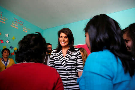 U.S. Ambassador to the United Nations Nikki Haley listens to children during a visit to El Refugio shelter, which provides care to underage victims of violence and human trafficking, in Guatemala City, Guatemala, February 28, 2018. REUTERS/Luis Echeverria