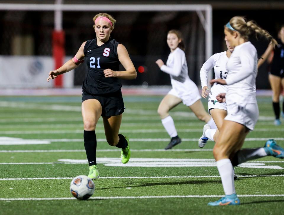 South Salem's Mya Fry (21) chases after the ball during the game against Tigard on Tuesday, Sept. 13, 2022 in Salem, Ore.