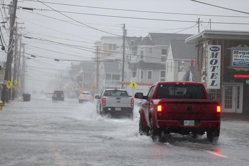 A winter storm rips through Hampton Beach leaving streets flooded and damage from high winds on Jan. 17, 2022.