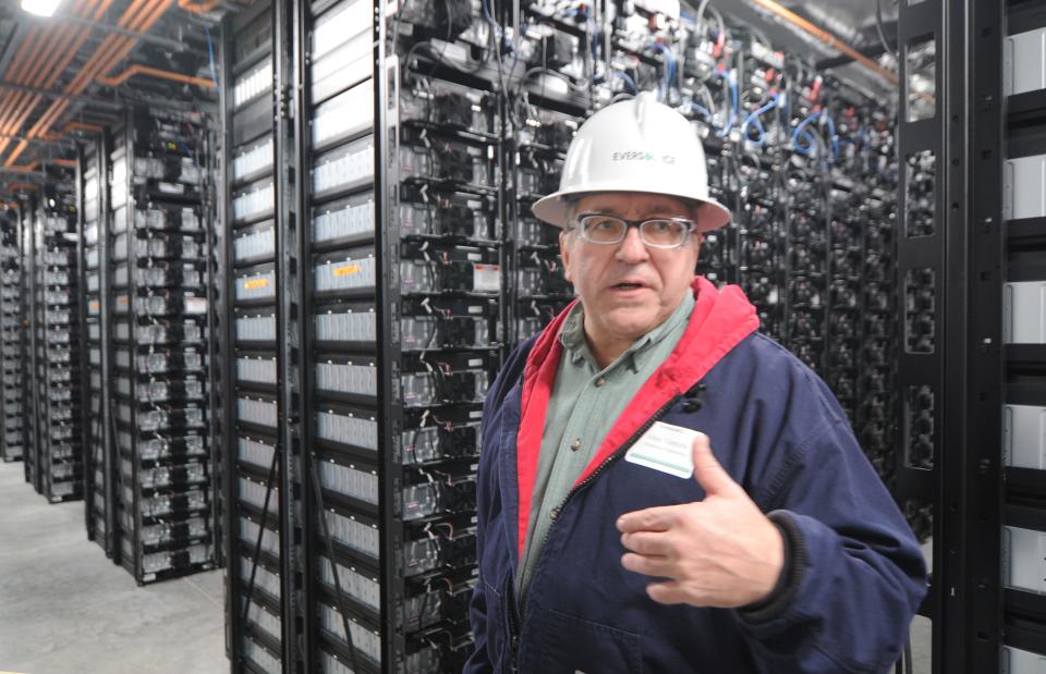 John Ventura, Eversource manager of distribution engineer for the south region, is surrounded by battery racks inside the new Provincetown Battery Energy Storage System on Monday. The battery station will provide power to 10,000 customers in the event of an outage.