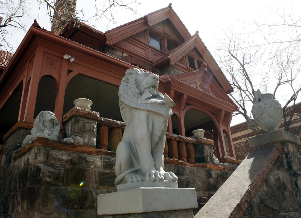 This March 12, 2012 photo shows lions guarding the front of the Molly Brown House Museum in Denver. A few blocks from Colorado's state Capitol _ over 1700 miles from the Atlantic Ocean and a mile above sea level _ is a museum dedicated to a woman eclipsed by legend following the sinking of the Titantic. The "unsinkable Molly Brown" moved into this stone Victorian home after she and her husband struck it rich at a gold mine in Colorado's mountains, nearly 20 years before she boarded the Titanic because it was the first boat she could get back home to visit her ailing grandson. (AP Photo/Ed Andrieski)