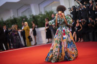 File - Actress Zazie Beetz poses for photographers upon arrival at the premiere of the film 'Joker' at the Venice Film Festival. The 77th Venice Film Festival will kick off on Wednesday, Sept. 2, 2020, but this year's edition will be unlike any others. Coronavirus restrictions will mean fewer Hollywood stars, no crowds interacting with actors and other virus safeguards will be deployed. (Photo by Arthur Mola/Invision/AP, File)