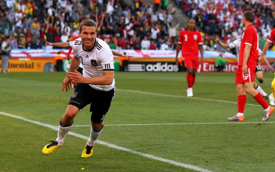 Lukas Podolski of Germany celebrates scoring his side's second goal  - Getty Images