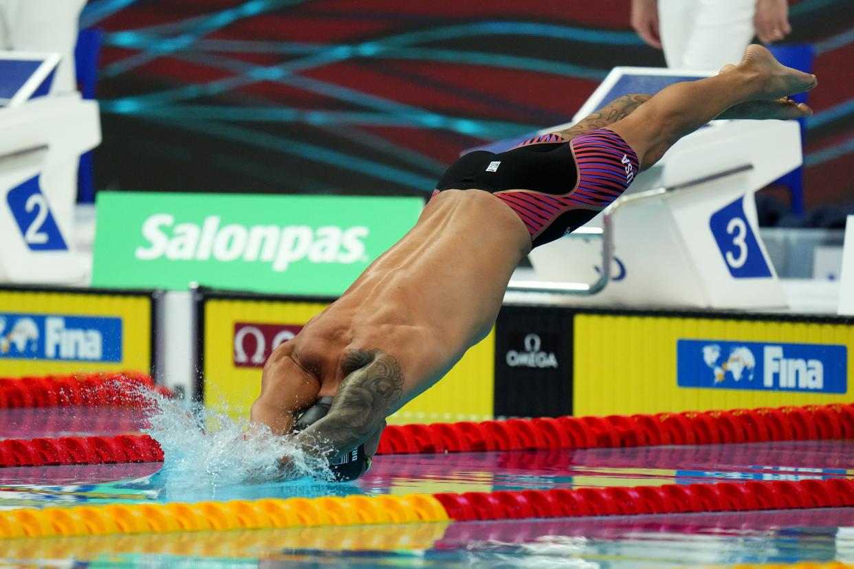 Caeleb Dressel races at the 50-meter butterfly semifinal on Saturday. Dressel, who has already won two gold medals at the world championships, withdrew Wednesday from the rest of the meet.