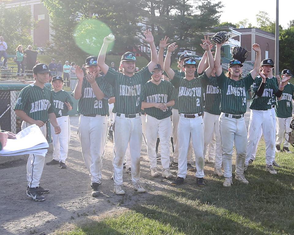 The Abington baseball team celebrates Steve Perakslis's 300th win at Frolio Field in Abington on Wednesday, May 25, 2022. Abington head coach Steve Perakslis won his 300th win with the victory.