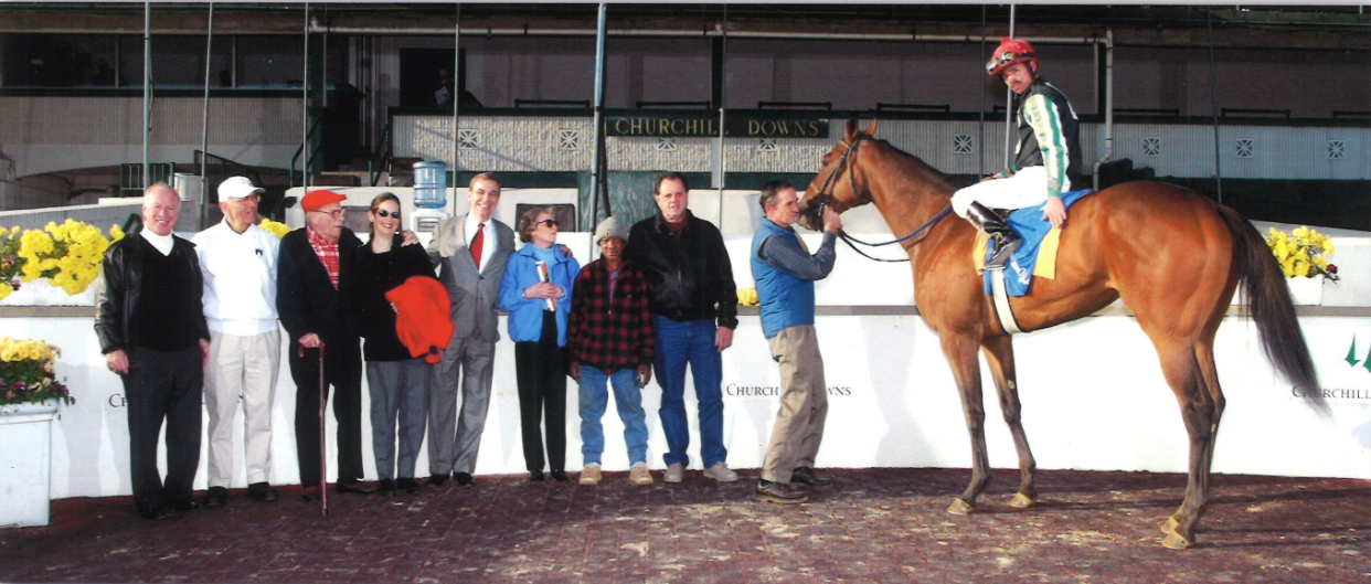 Bob Heleringer (pictured middle in a red tie) The Day his horse PUT ME IN won 11/19/2002