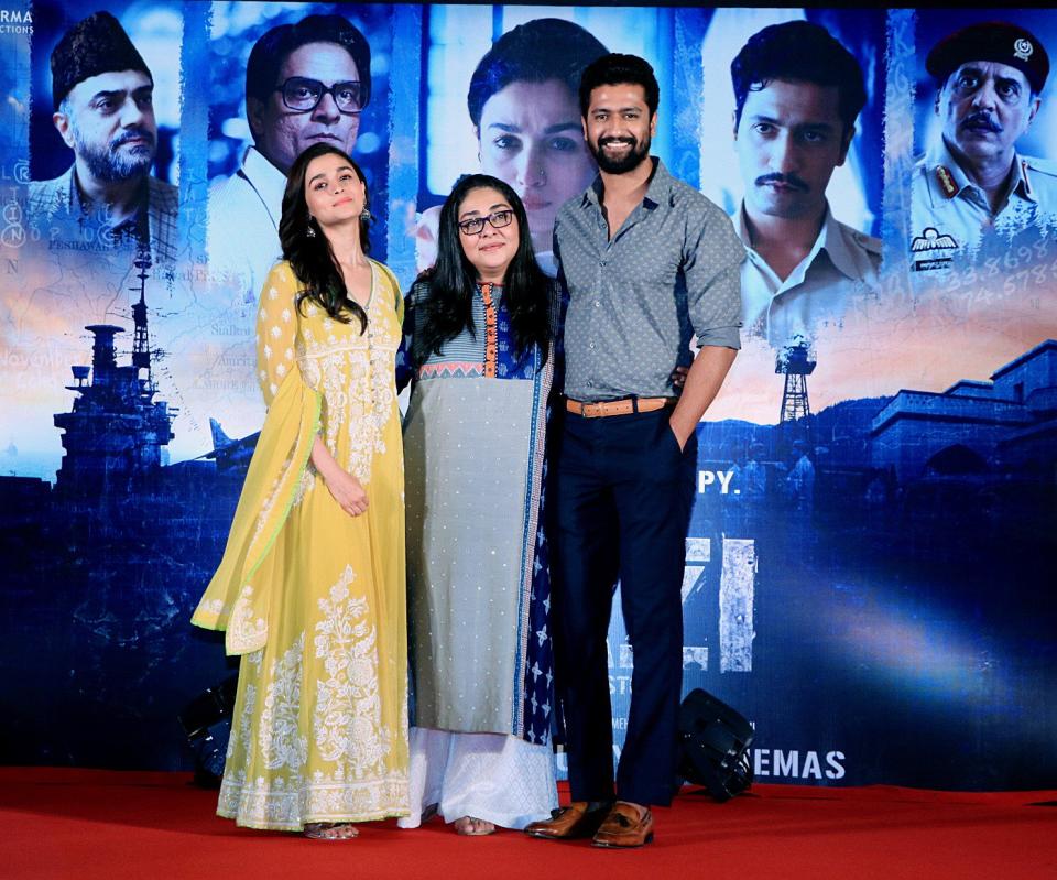 Meghna Gulzar poses with her lead pair -Alia Bhatt and Vicky Kaushal.