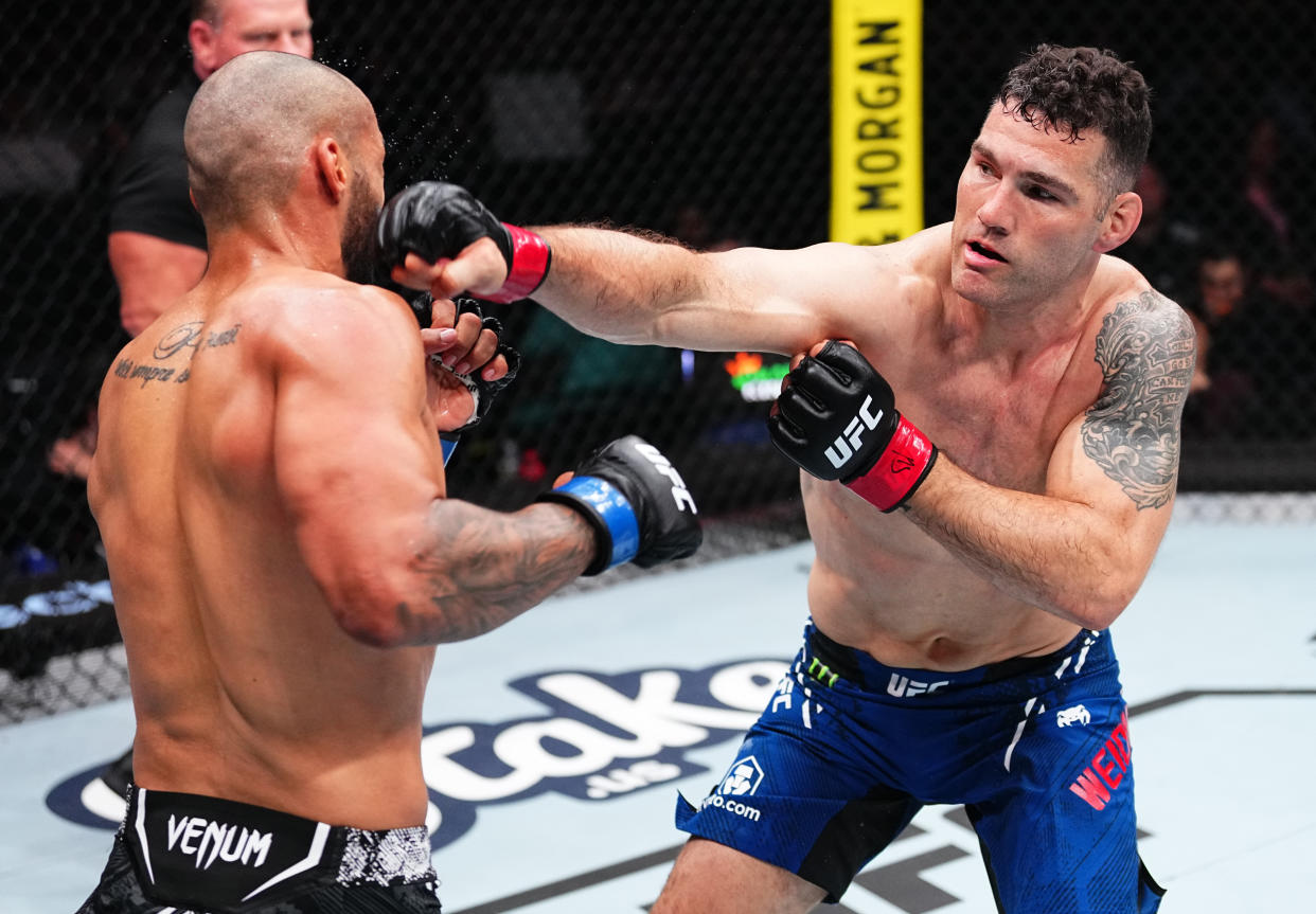 ATLANTIC CITY, NEW JERSEY - MARCH 30: (R-L) Chris Weidman punches Bruno Silva of Brazil in a middleweight bout during the UFC Fight Night event at Boardwalk Hall Arena on March 30, 2024 in Atlantic City, New Jersey. (Photo by Jeff Bottari/Zuffa LLC via Getty Images)