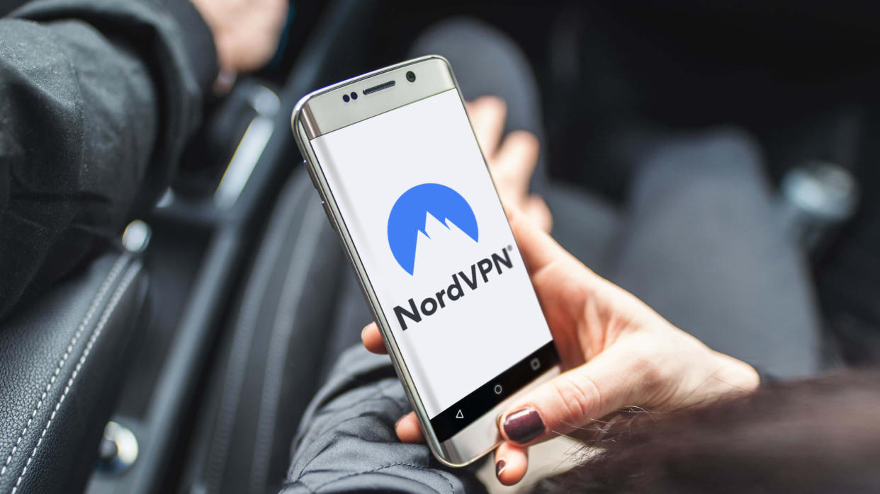  NordVPN running on an Android smartphone being held in one hand. 