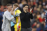 Arsenal's manager Mikel Arteta applauds the fans after the end of the English Premier League soccer match between, Arsenal and Nottingham Forrest at the Emirates stadium in London, Sunday, Oct. 30, 2022. Arsenal won the game 5-0. (AP Photo/David Cliff)