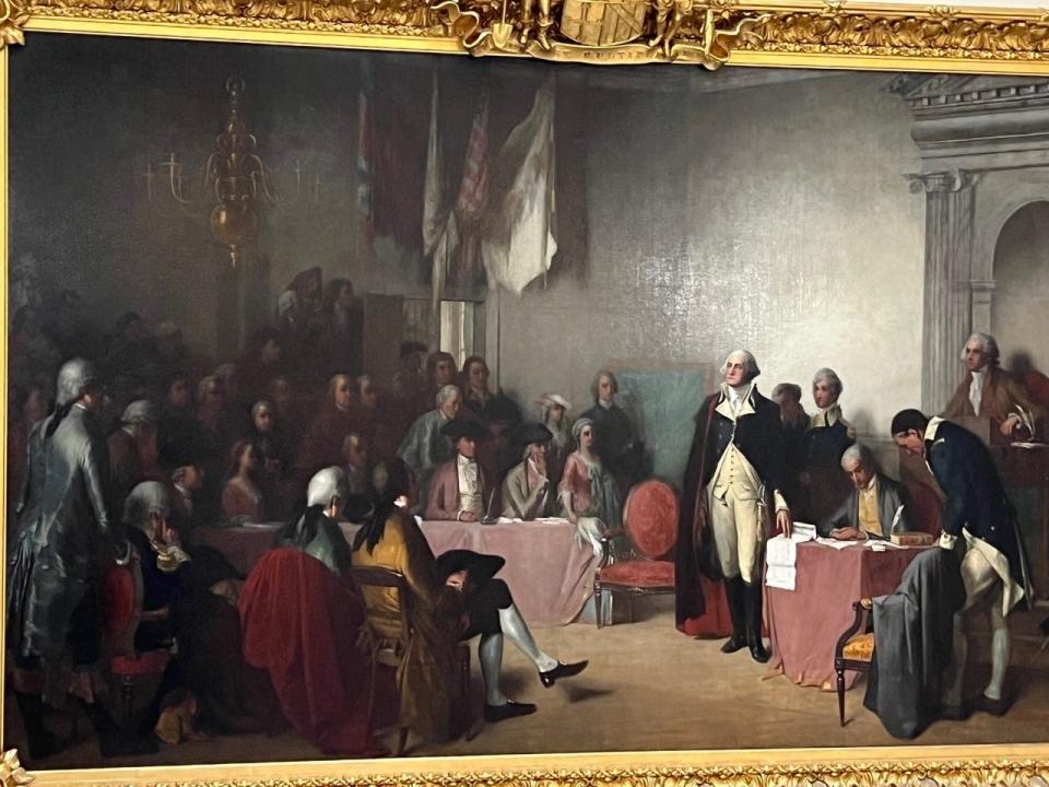 A painting depicting the scene in the Old Senate Chamber in Annapolis when General George Washington resigned his commission as commander-in-chief of the Continental Army after the Revolutionary War in 1783. The painting, which hangs in the State House, is an oil on canvas done in 1858.