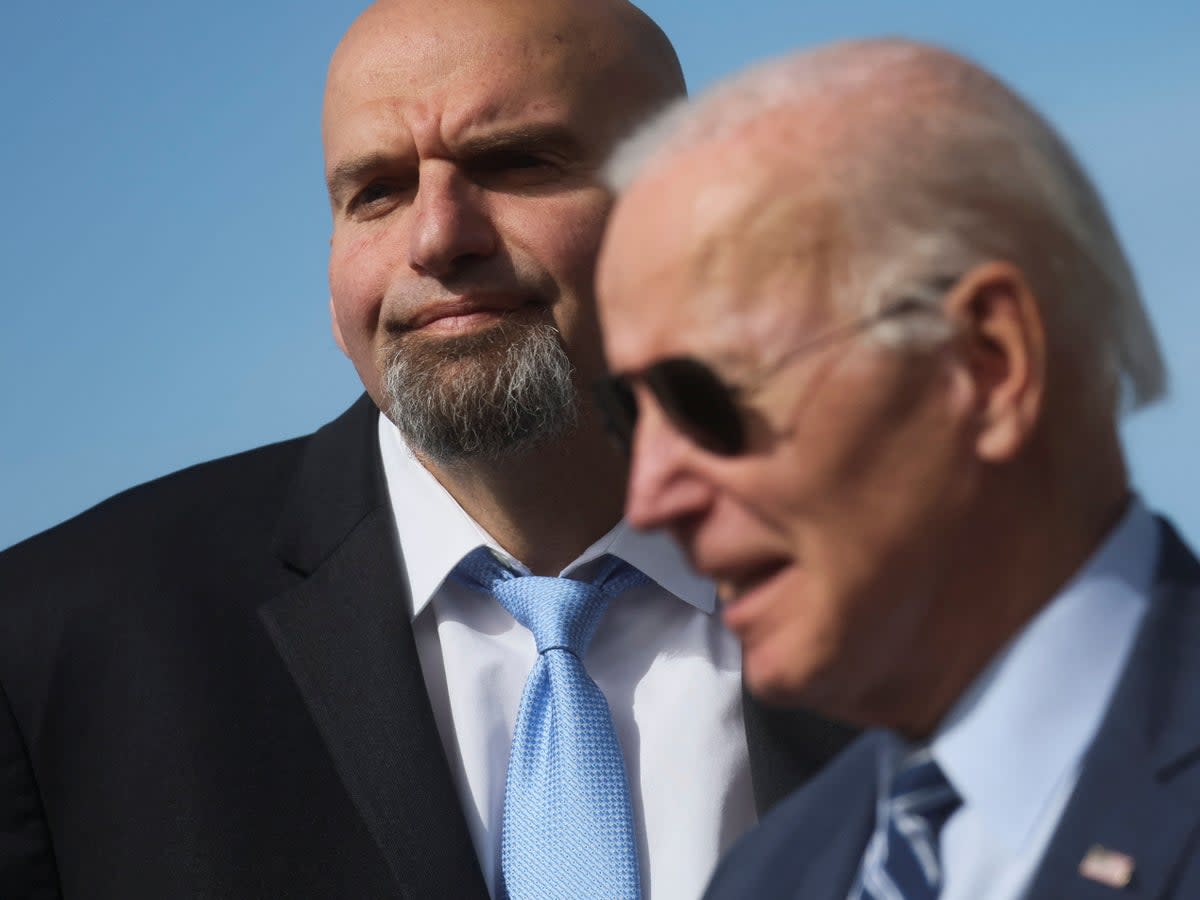 Joe Biden campaigning with John Fetterman in Pennsylvania (REUTERS)